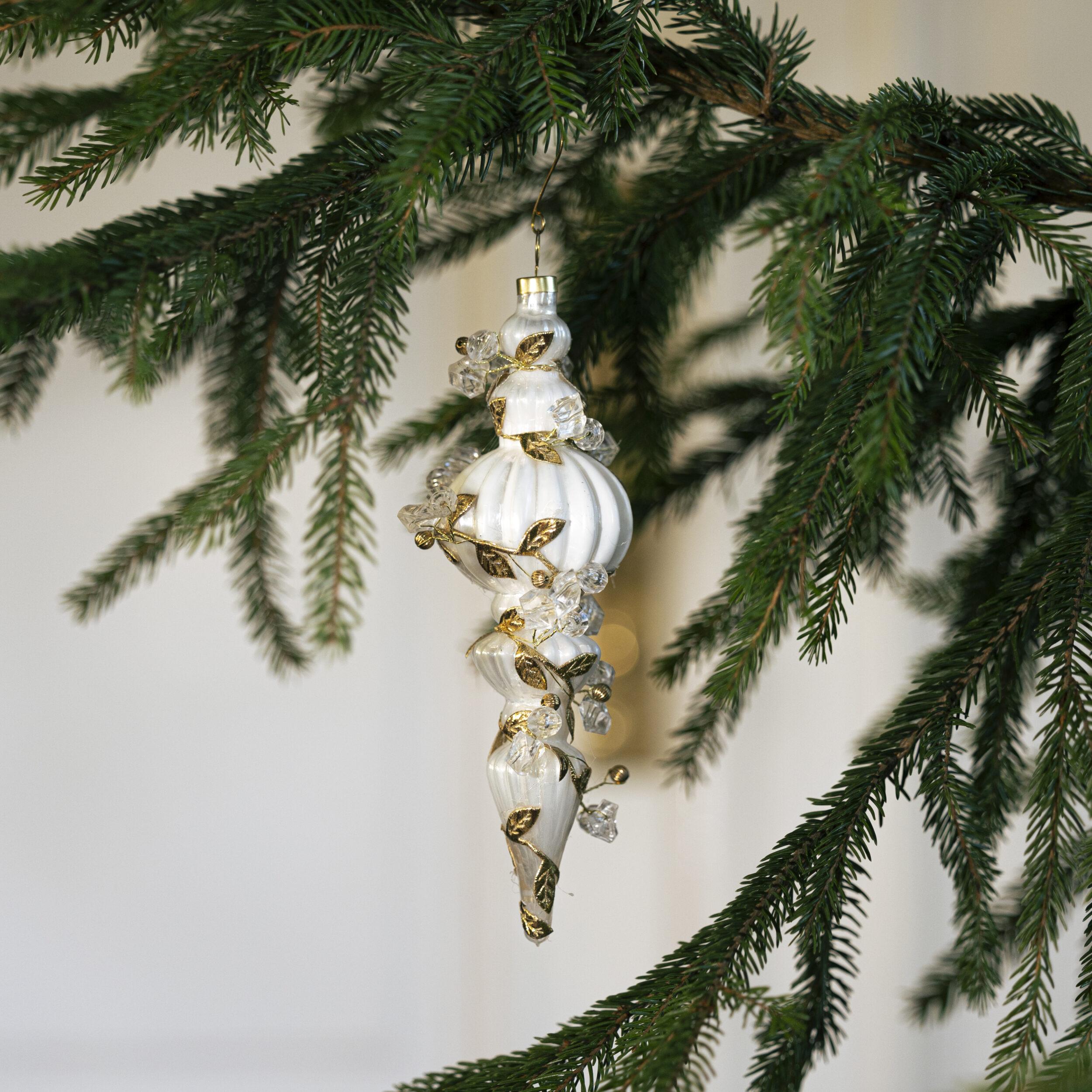 Jääpuikko kultakoristein